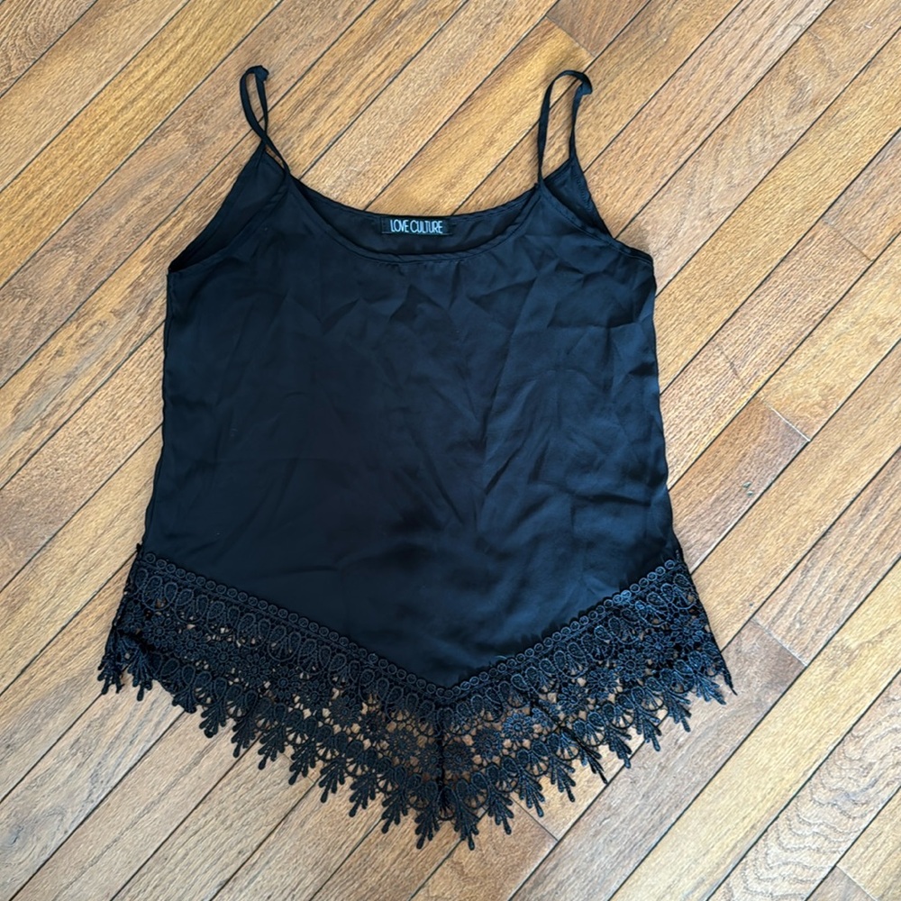 Love culture black laced tank top. Used but brand new condition.